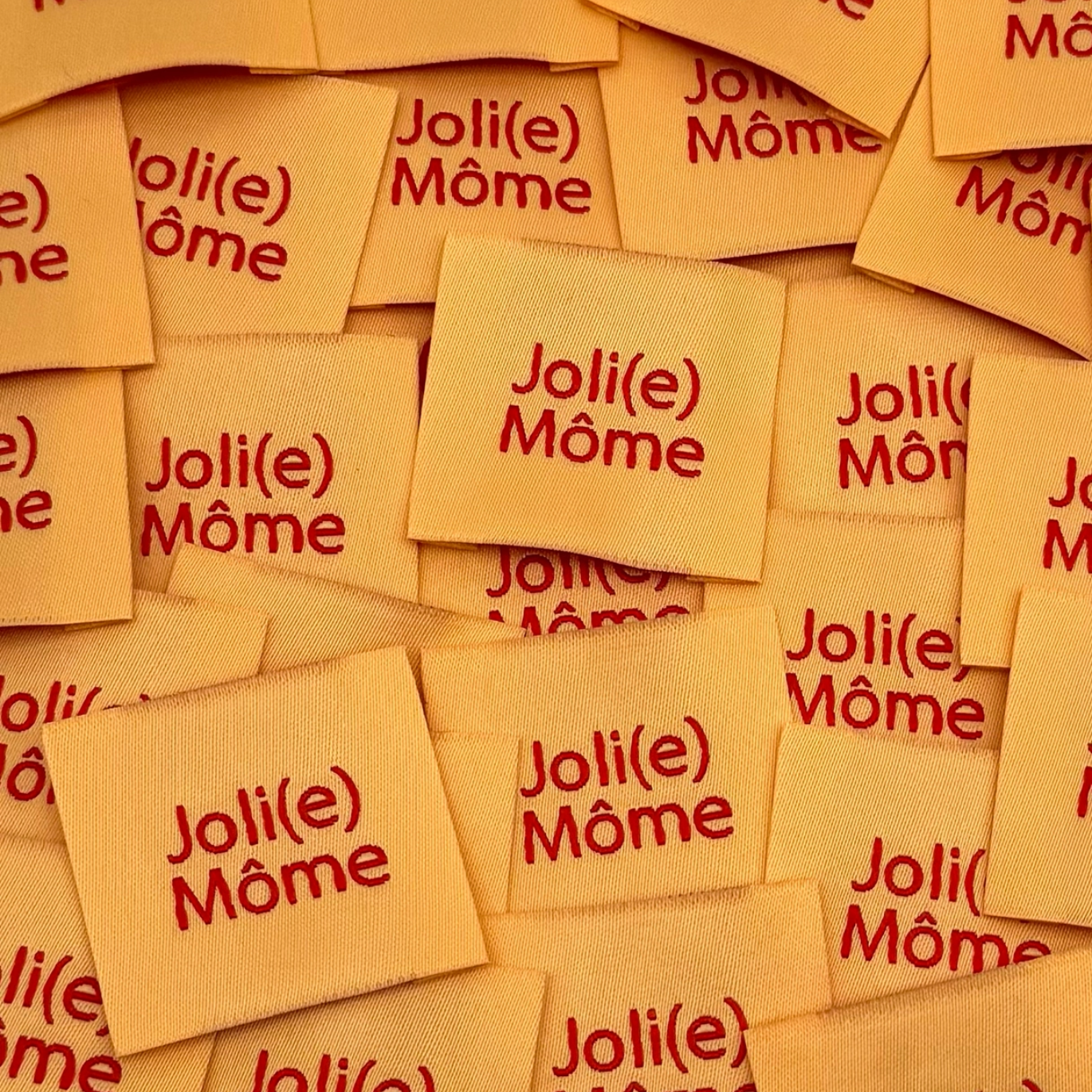 Étiquette à coudre "Joli(e) Môme" Pêche