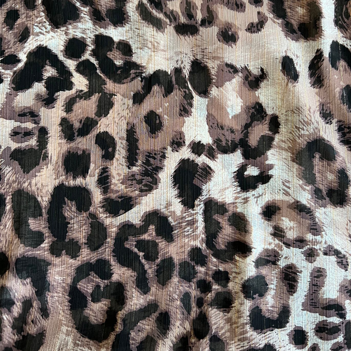 Tissu polyester gold lurex print léopard